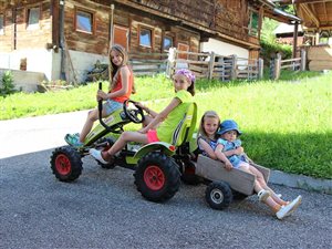 Enjoying our toys, having fun on our farm
